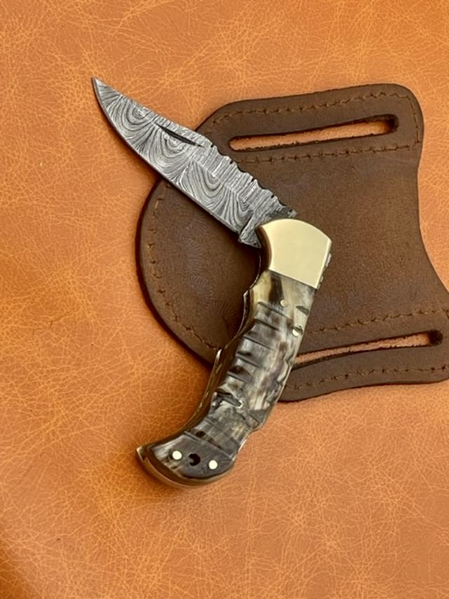 Hand forged Damascus steel pocket knives